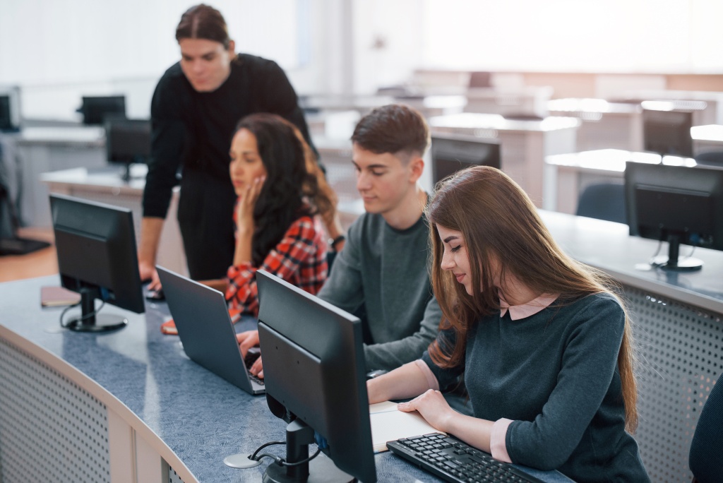 spacious-area-group-young-people-casual-clothes-working-modern-office (1).jpg